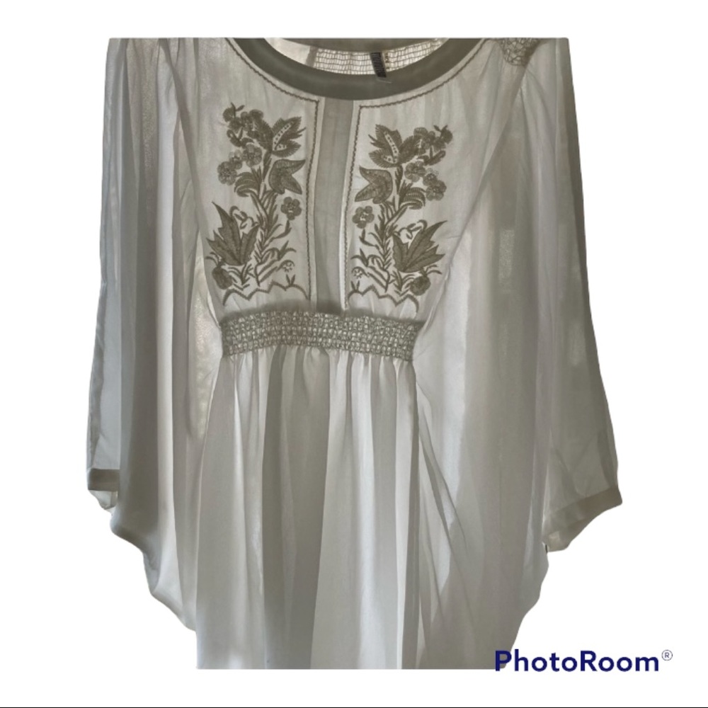 Elegant ivory embroidery blouse. Beautiful